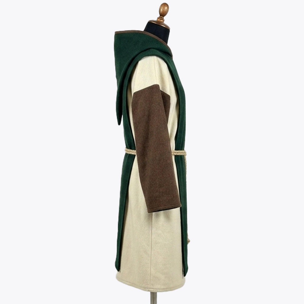 Side profile of the ivory habit showing the brown edge trim at the hood opening and rope cincture