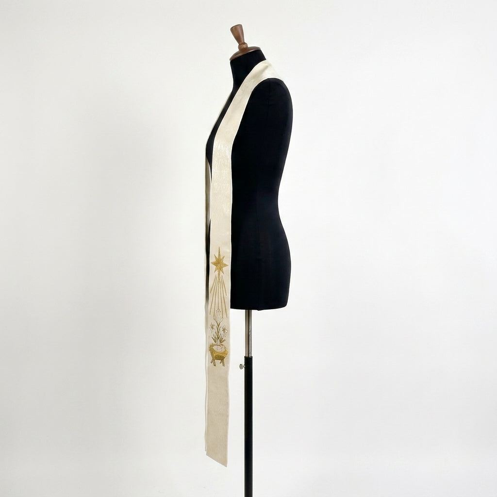 Close side view of the Ivory Nativity Clergy Stole showing the gold star above the manger scene