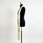 Close side view of the Ivory Nativity Clergy Stole showing the gold star above the manger scene