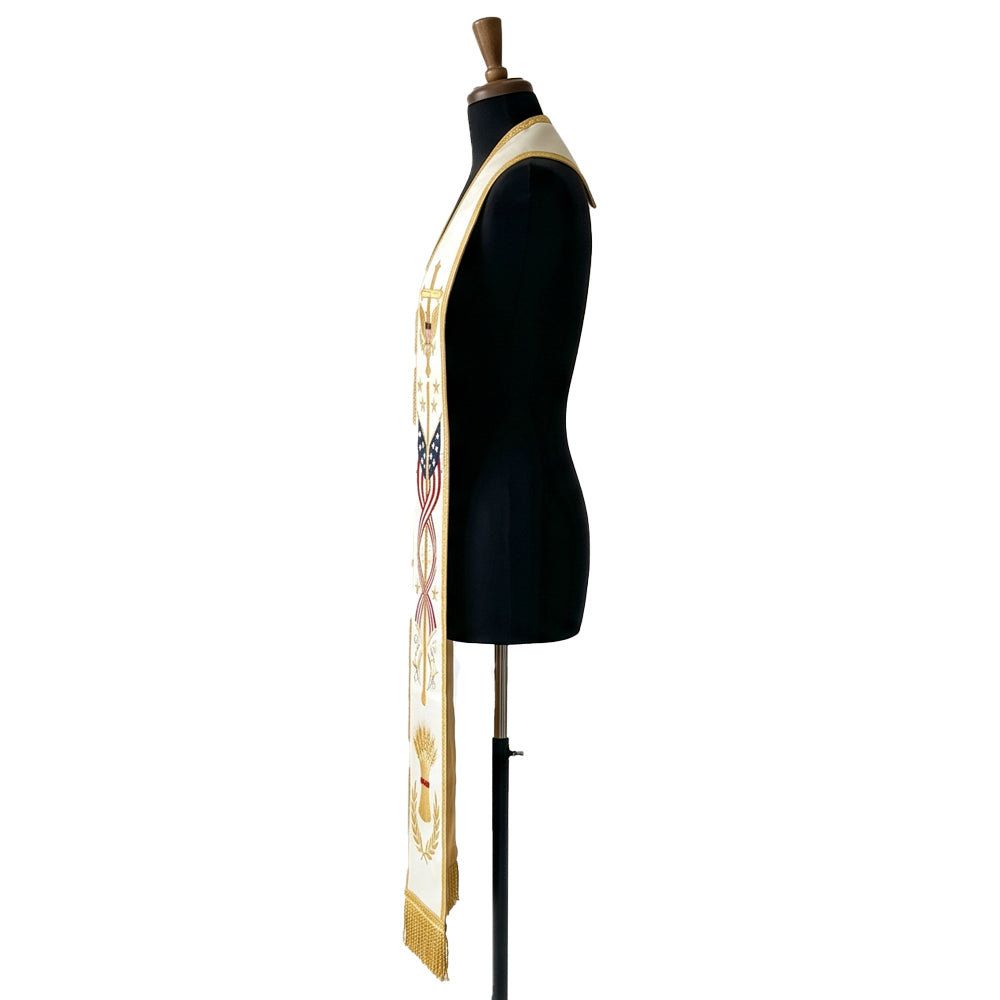 Side profile of the Ivory Patriotic Clergy Stole showing the crossed American flags and twisted ribbon detail