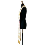 Side profile of the Ivory Patriotic Clergy Stole showing the crossed American flags and twisted ribbon detail