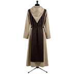 Back view of the tan habit showing the matching brown scapular extending past the tan hemline.