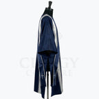 Side view of the navy blue dalmatic showing the open sleeve and the silver cross embroidered at the end of the stole