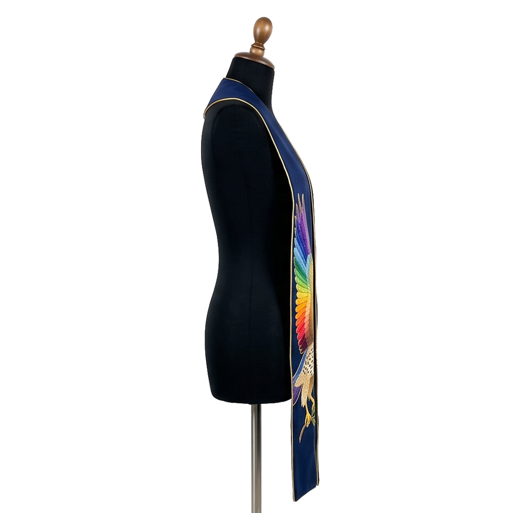 Close side view of the navy eagle stole showing the rainbow-gradient wing feathers on a dress form.