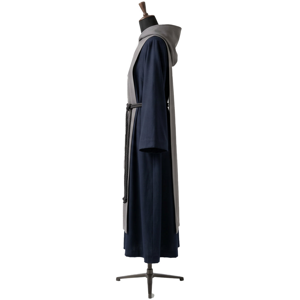 Side profile of a navy and grey monk habit showing the standing hood and bell sleeve shape.