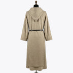 Back view of the oatmeal habit showing the plain pointed hood and unbroken single colour