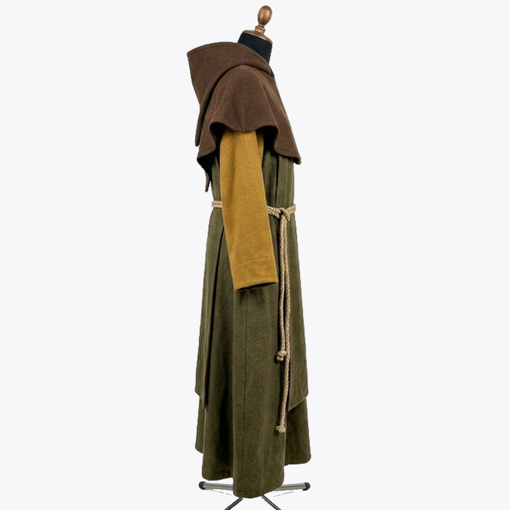 Side profile of the olive habit showing the brown shoulder cape sitting over the mustard sleeve