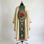 Back of the Guadalupe chasuble with a green orphrey: gold stars, a bouquet of red and pink roses in an oval of golden rays above a crescent moon, and a rose vine to the hem