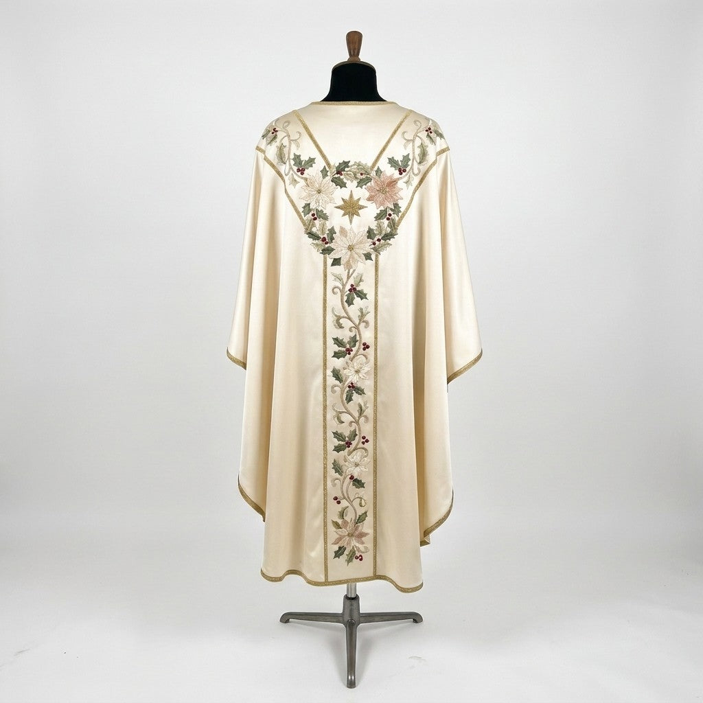 Back of the ivory poinsettia chasuble with a Y-shaped orphrey: holly wreath and gold star across the shoulders and a trailing vine of poinsettias and holly