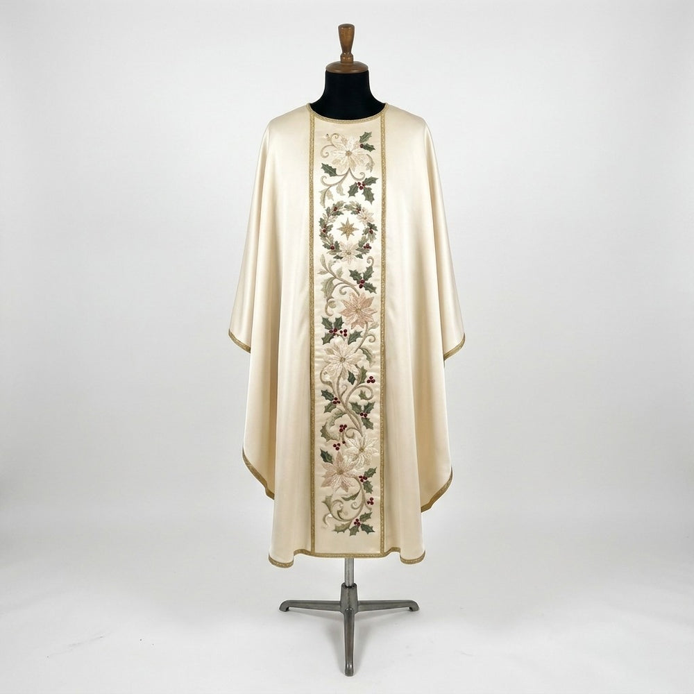 Front of an ivory satin Christmas chasuble with a column orphrey of a holly wreath round a gold star, blush poinsettias, holly and red berries