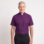 The short-sleeve version of the purple tab-collar clergy shirt, worn with dark trousers.