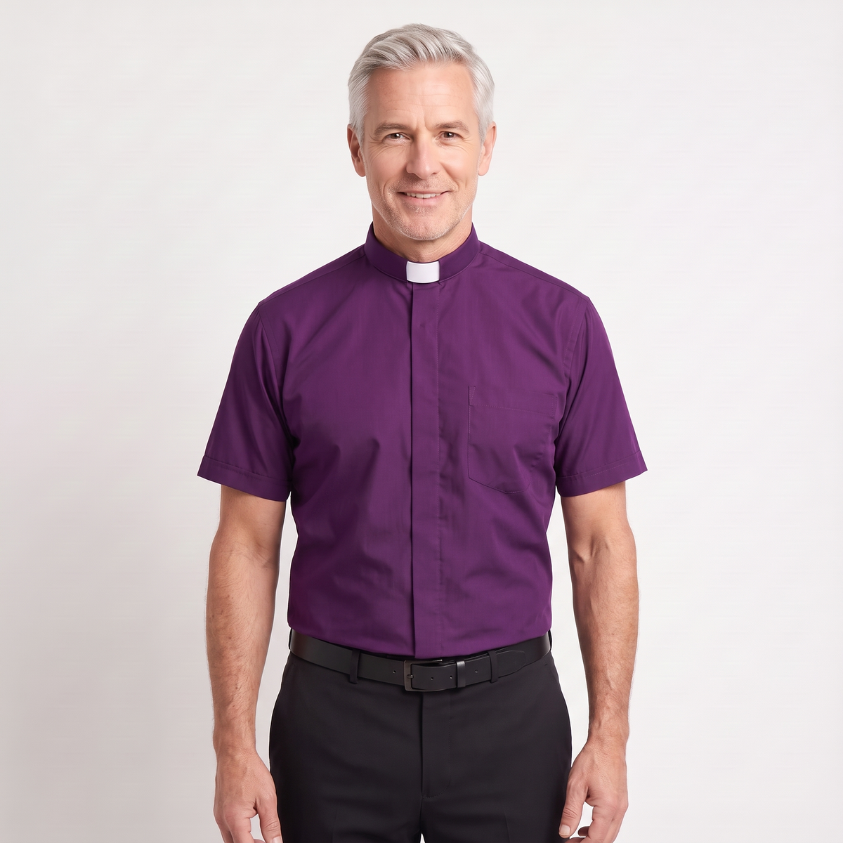 The short-sleeve version of the purple tab-collar clergy shirt, worn with dark trousers.