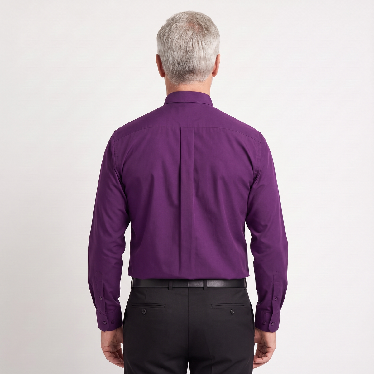 Back view of the purple clergy shirt showing the shoulder yoke and centre pleat.
