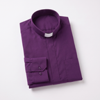 The purple long-sleeve clergy shirt folded, with the collar standing and a buttoned barrel cuff visible.