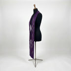 Close-up of the thorn vine and nail embroidery on the purple Lenten Stole's plain satin panel.