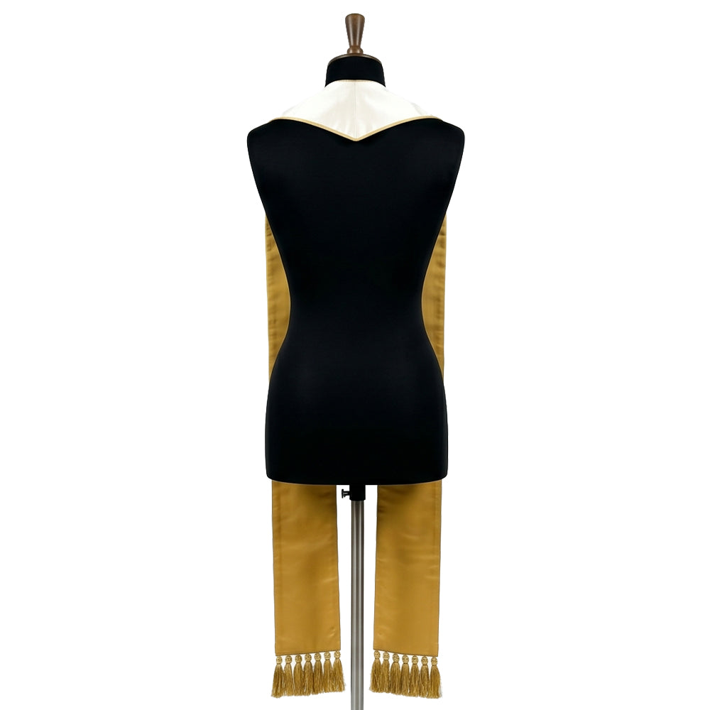 Back view of the ivory Radiant Cross Stole on a mannequin, showing the plain gold satin-look reverse and fringe.
