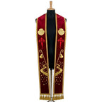Red velvet-look stole laid flat with a shell, a red Cross of Saint James, a pilgrim's staff and a starry winding path.