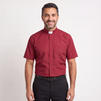 The short-sleeve version of the red tab-collar clergy shirt, worn with dark trousers.