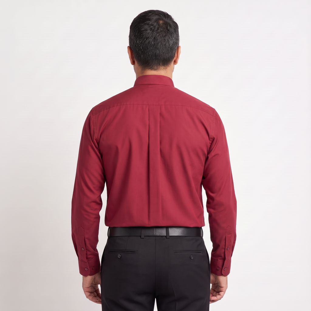 Back view of the red clergy shirt showing the shoulder yoke and centre pleat.