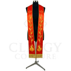Red-orange Pentecost stole on a mannequin, gold dove, vine of crosses and flame embroidered down both panels.