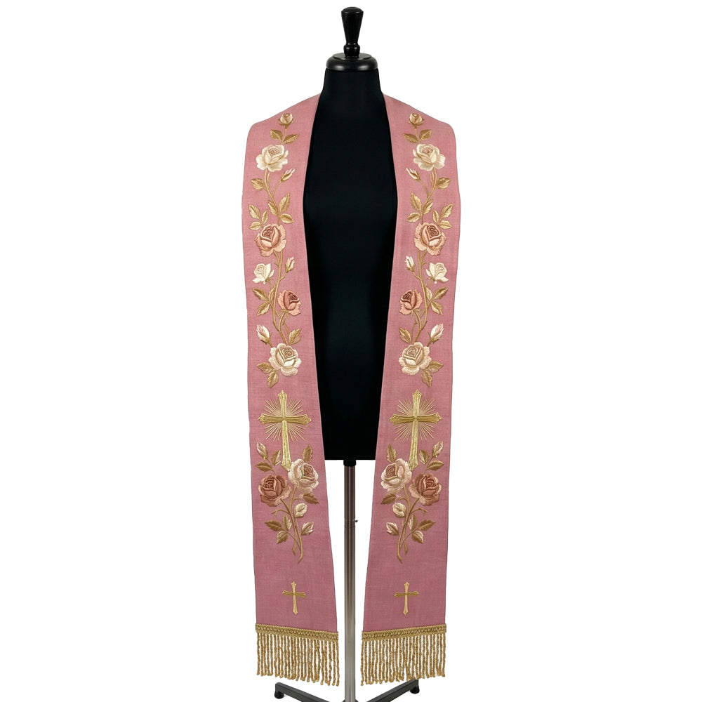 Rose stole on a mannequin, cream and blush rose vine with a radiant gold cross embroidered on both panels.