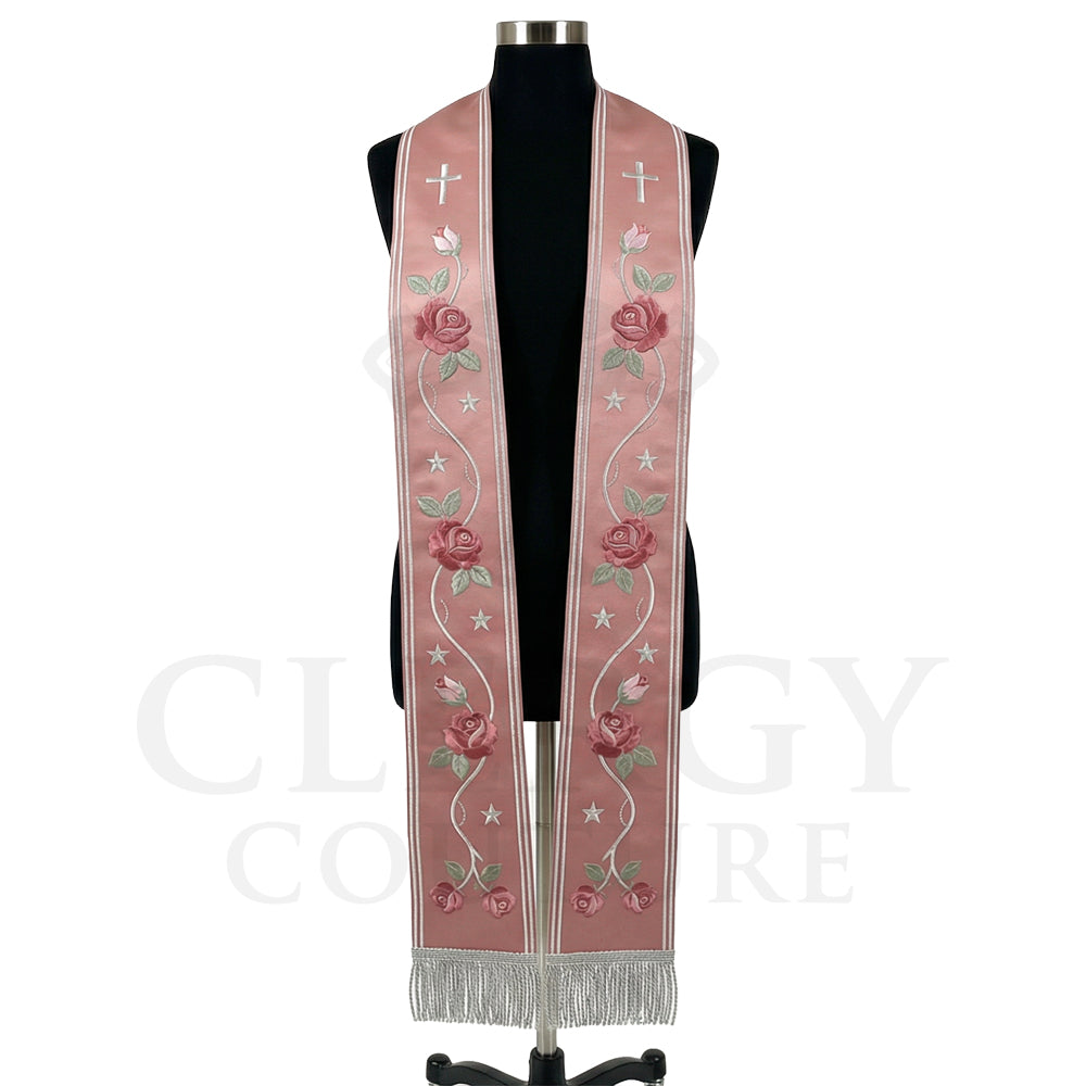 Rose pink striped stole on a mannequin, silver cross, star ribbon trail and roses on both panels.
