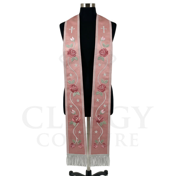 Rose pink striped stole on a mannequin, silver cross, star ribbon trail and roses on both panels.