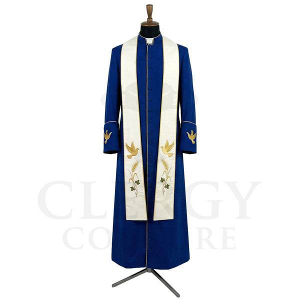 Front view of a royal blue clergy cassock robe worn with the optional cream stole embroidered with gold doves and wheat.