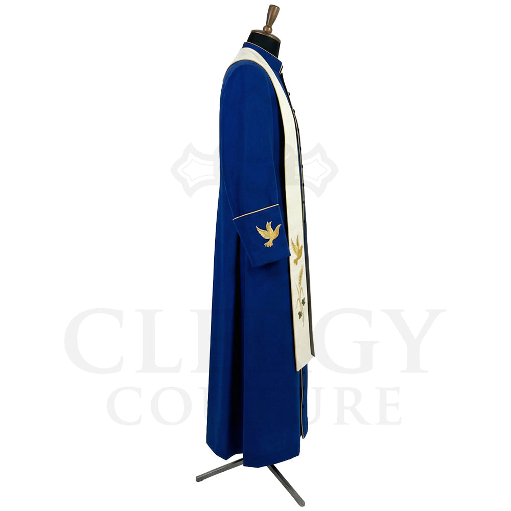 Side view of the royal blue cassock robe showing the hip pocket marked with a gold dove and the cream stole at the shoulder.