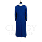 Back view of the royal blue cassock robe without the stole, showing the pointed cream yoke across the shoulders.