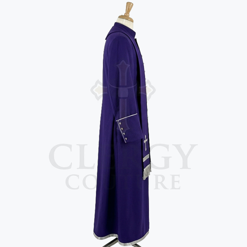 Side view of the royal purple cassock robe showing the flapped hip pocket and the silver piping at the cuff.