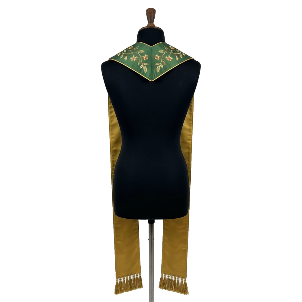 Back view of the green Franciscan stole showing the gold-toned lining and floral neck yoke.