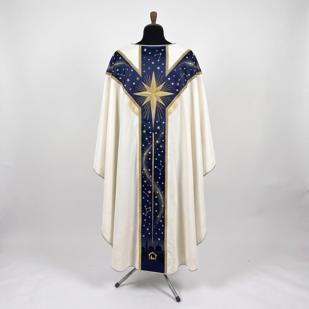 Back of the Star of Bethlehem chasuble with a Y-shaped navy orphrey: a large radiant gold star across the yoke, starry sky and the town of Bethlehem at the hem