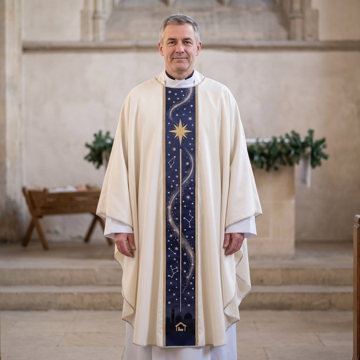 A priest wearing the ivory Star of Bethlehem chasuble with navy night-sky orphrey in a stone church with evergreen garlands