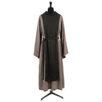 Front view of a stone grey monk habit with a full-length black scapular, hood and rope cincture.
