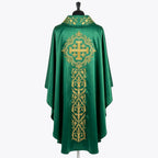 Back of the green chasuble showing a gold Jerusalem cross in a quatrefoil above a column of vine and wheat scrollwork