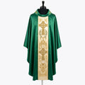 Front of a green gothic chasuble with a broad ivory orphrey embroidered with two gold Celtic crosses, a gothic arcade, a chalice and wheat