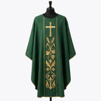 Front of a green gothic chasuble embroidered in gold with a budded cross, wheat ears and a fruiting grapevine within a piped orphrey panel