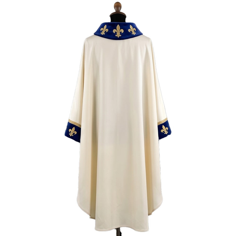 Plain ivory back of the chasuble showing the blue velvet collar and cuff bands set with gold fleur-de-lys