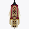 Front of an ivory satin chasuble with a red velvet orphrey embroidered in gold with the Sacred Heart of Jesus, shown with a matching red stole