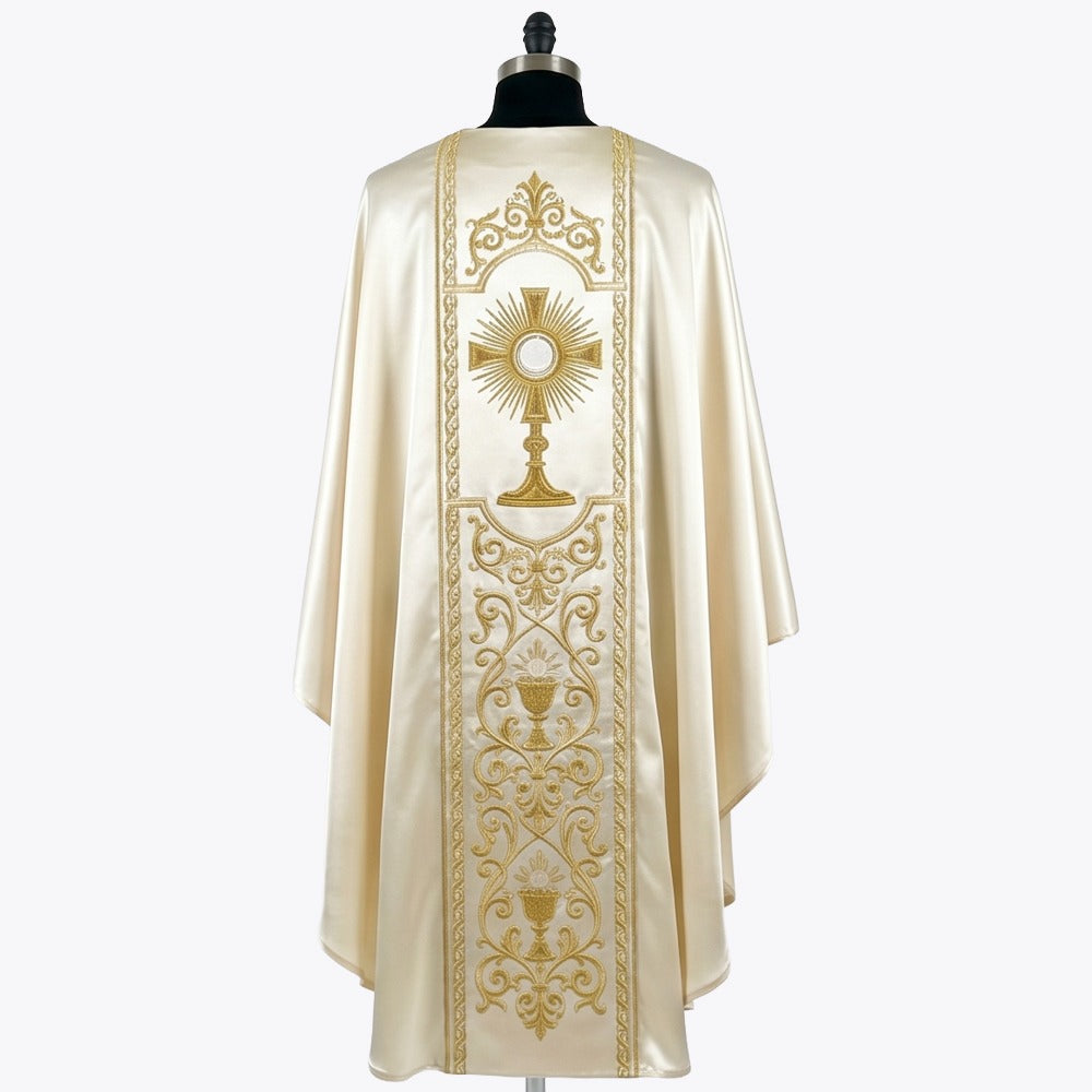 Back of the ivory chasuble embroidered tone on tone with a monstrance above a chalice within gold braided columns