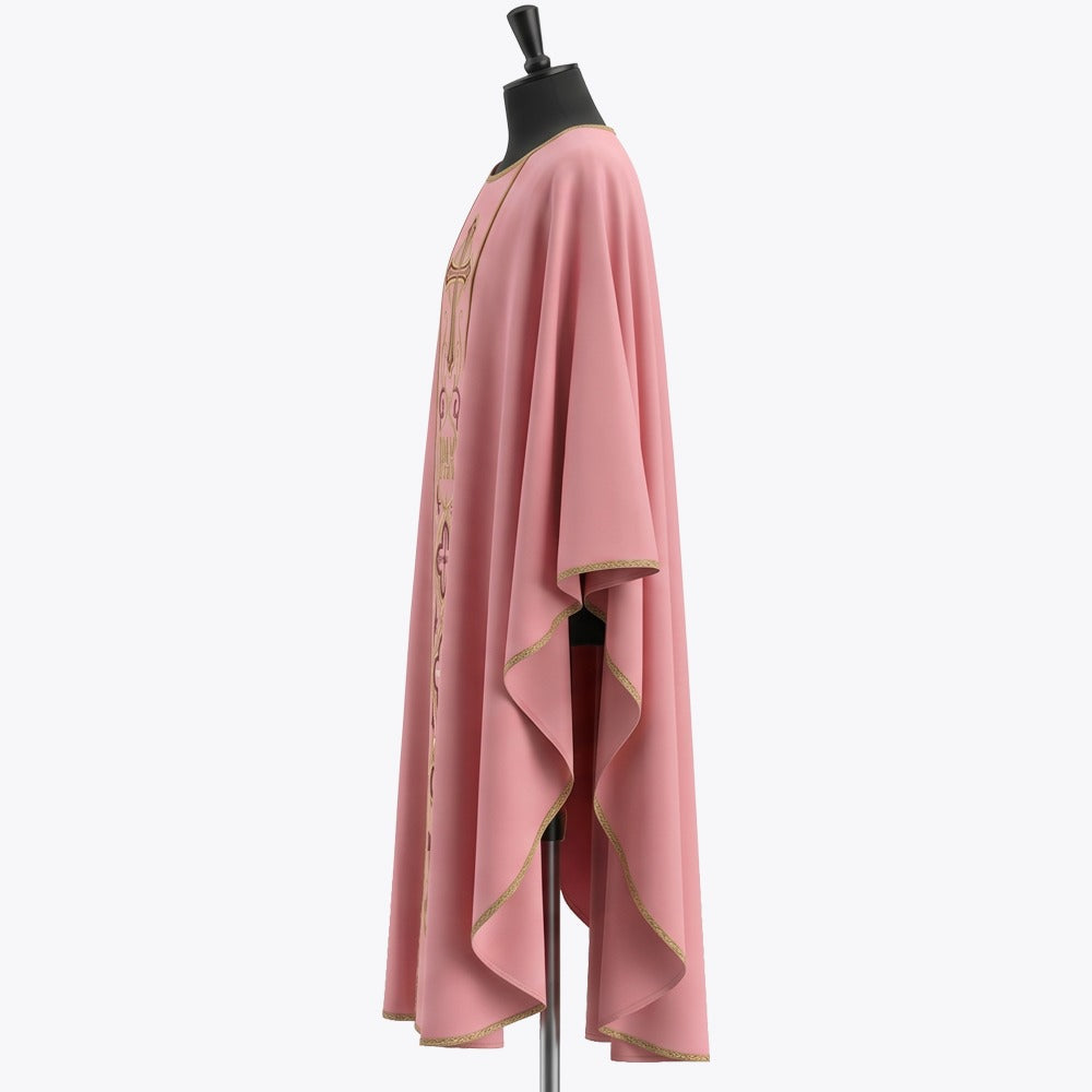 Side view of the rose chasuble showing the gold braided hem and the full gothic drape over the arm