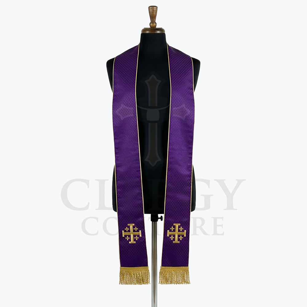Violet stole laid flat showing its faint diamond-weave texture, gold edge piping and a Jerusalem cross at each end.