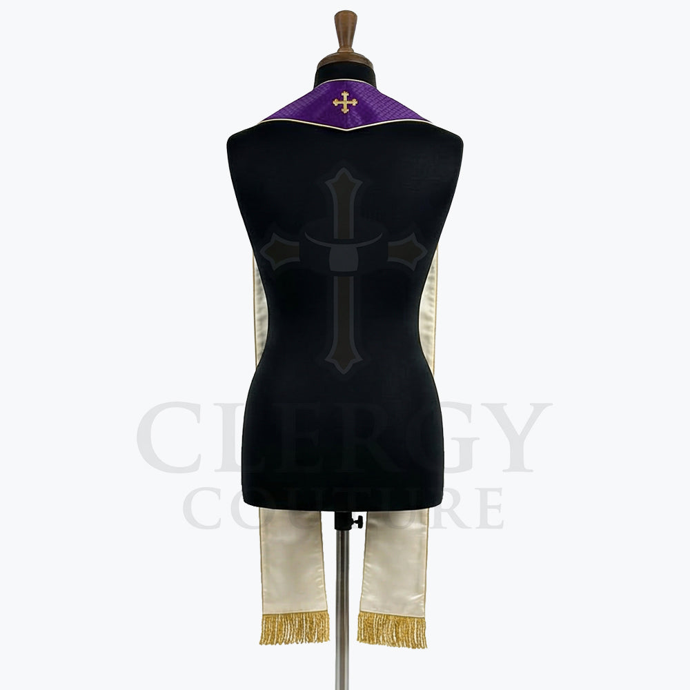 Back view of the violet stole on a dress form, revealing its ivory satin reverse and gold Jerusalem cross at the collar.