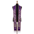 Violet stole laid flat with a continuous silver and gold vine embroidery running each panel to a tree motif at the hem.