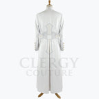 Back view of the white cassock robe, showing the plain back and the centre vent through the skirt.